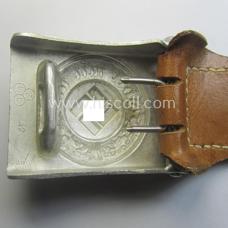 Police (ie. 'Polizei') aluminium-based belt-buckle (ie. 'Koppelschloss für Mannschaften u. Uffz. der Polizei') being a maker- (ie. 'F.L.L.'-) marked and/or: '1942'-dated example that comes in a fully untouched, condition