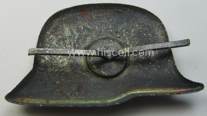 Bright-silverish-toned- (and I deem tin-based) so-called: 'photo-album-device' being a non-maker-marked example depicting a German steel-helmet