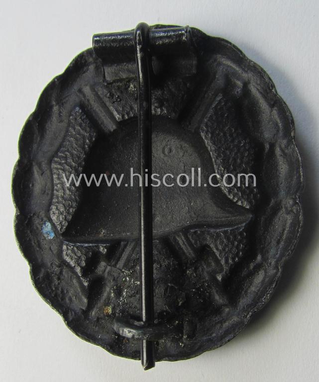 WWI-pattern, black-class wound-badge (ie.: 'Verwundeten Abzeichen in Schwarz') being a very detailed (and magnetic) example that comes in a just minimally used- ie. worn, condition