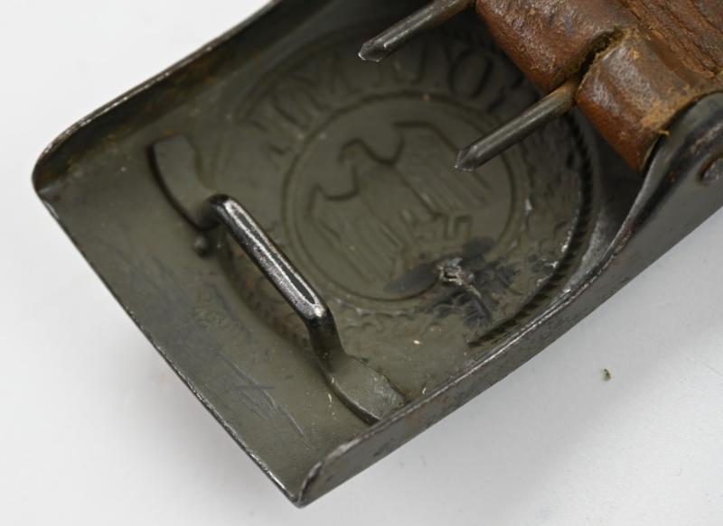 German WH Beltbuckle with Schrapnel damage and Tab 'E.Schneider'