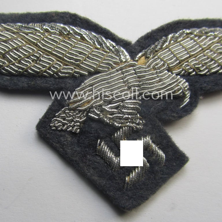 'Virtually mint' WH (Luftwaffe) officers'-pattern breast-eagle (ie. 'Brustadler für Offiziere der Luftwaffe') being a neatly hand-embroidered example of the: 'Extra Qualität' that comes in a never used- nor tunic-attached, condition
