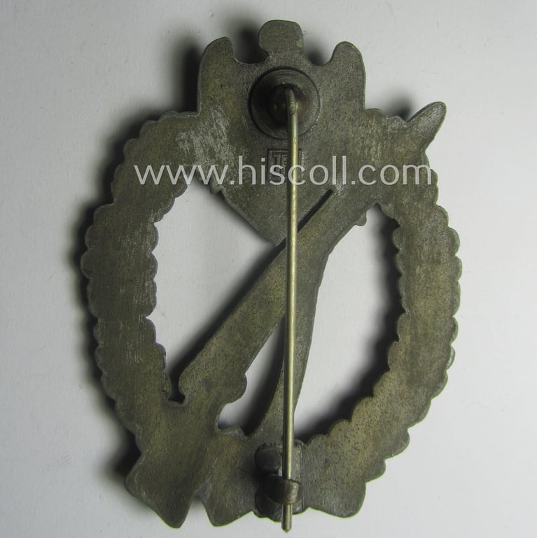 'Infanterie Sturmabzeichen in Bronze' being a maker- (ie. 'JFS'-) marked, 'solid-back' example by the desirable maker: 'Josef Feix u. Söhne' as was executed in golden-bronze-coloured, zinc-based metal