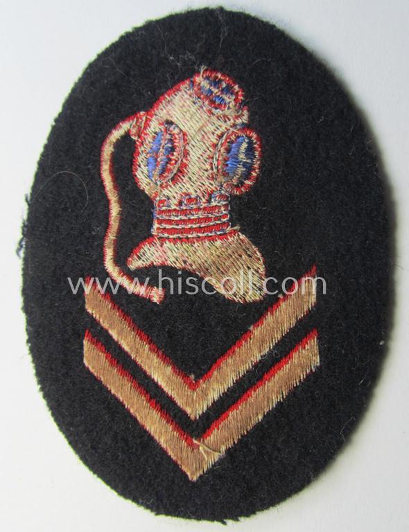 Superb - and actually rarely encountered! - WH (Kriegsmarine) neatly machine-embroidered, so-called: career- ie. specialist-armbadge (ie. 'Tätigkeits-Abzeichen') as was intended to signify the: 'Sonderausbildung für Torpedotaucher'