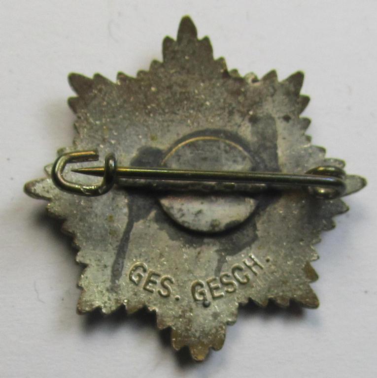 Semi-enamelled RLB- (ie. 'Reichluftschützbund') 'Zivilabzeichen' or: civil-attire badge (of the first pattern) that is void of a makers'-designation but that is bearing a patent-pending- (ie. 'Ges.Gesch.'-) marking on its back