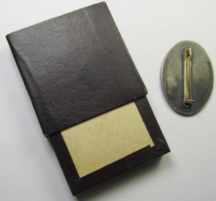 Pre-war-period- and/or silver-based (ie. '900'-stamped), so-called: 'Erinnerungszeichen Verdienste um das Feuerlöschwesen 1934' being a very detailed- and maker- (ie. 'Preuss. Staatsmünze'-) marked, example that comes stored in its period etui