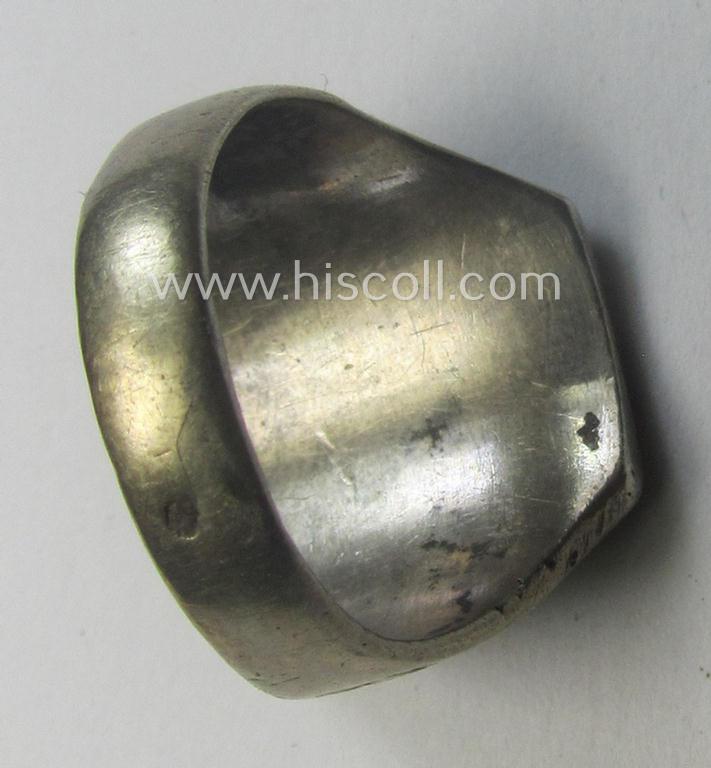 WH (LW-/Heeres- ie. 'Deutsches Afrikakorps'-) related, metal-based (ie. silver-coloured- and/or I deem genuine silver-based) so-called: 'souvenir'-ring depicting an engraved palmtree and desert scenery and showing the text: 'Tunis'