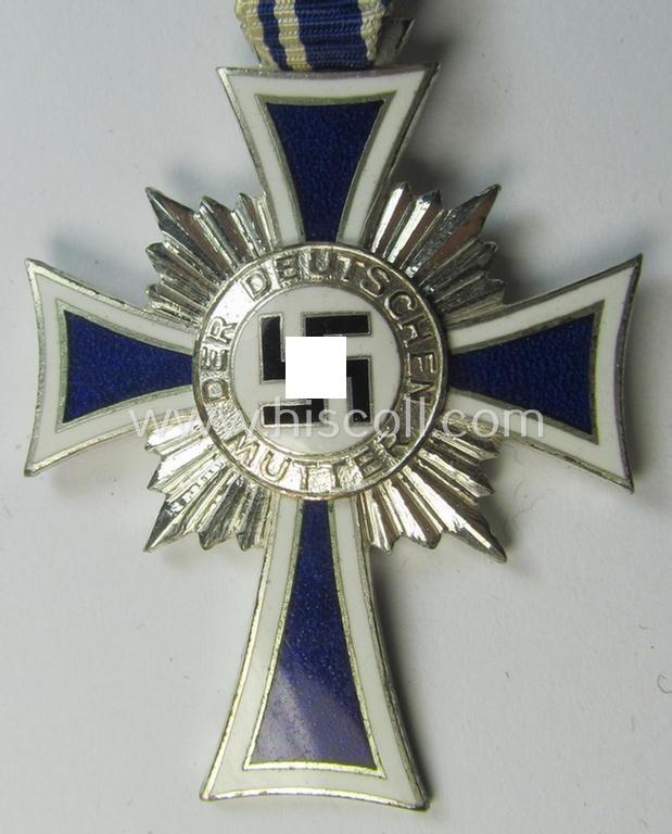 Superb, 'Ehrenkreuz der deutschen Mutter - zweite Stufe' being a non-maker-marked example that comes mounted onto its (large-sized!) ribbon and that comes in an overall very nice- (albeit minimally worn- ie. used-), condition