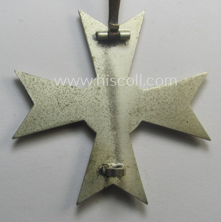 'Kriegsverdienstkreuz 1. Kl. ohne Schwn.' being a clearly maker- (ie. '4'-) marked and/or: 'Buntmetall'-based specimen by the: 'Steinhauer & Lück'-company