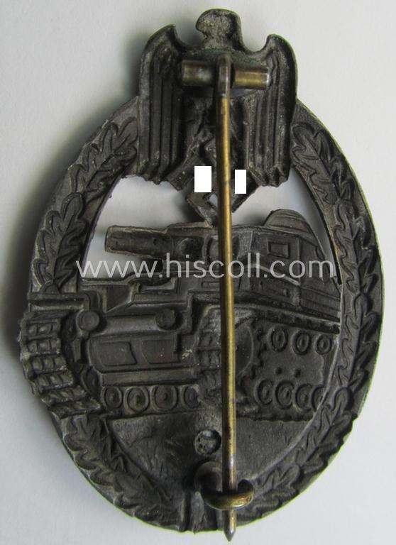 'Panzerkampfabzeichen in Bronze' (or: hollow-back, bronze-class panzer assault badge or PAB) being a neat zinc- (ie. 'Feinzink'-) version (of the so-called: 'first'-pattern) as was procuced by the: 'Paul Meybauer'-company