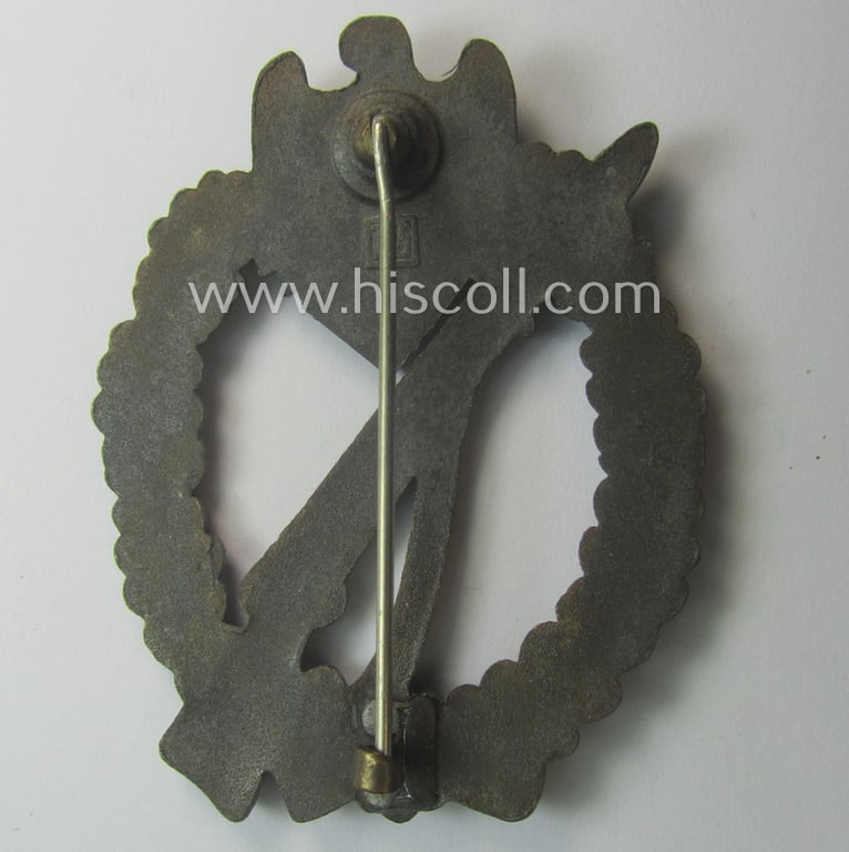 'Infanterie Sturmabzeichen in Bronze' being a maker- (ie. 'JFS'-) marked, 'solid-back' example by the desirable maker: 'Josef Feix u. Söhne' as was executed in golden-bronze-coloured, zinc-based metal