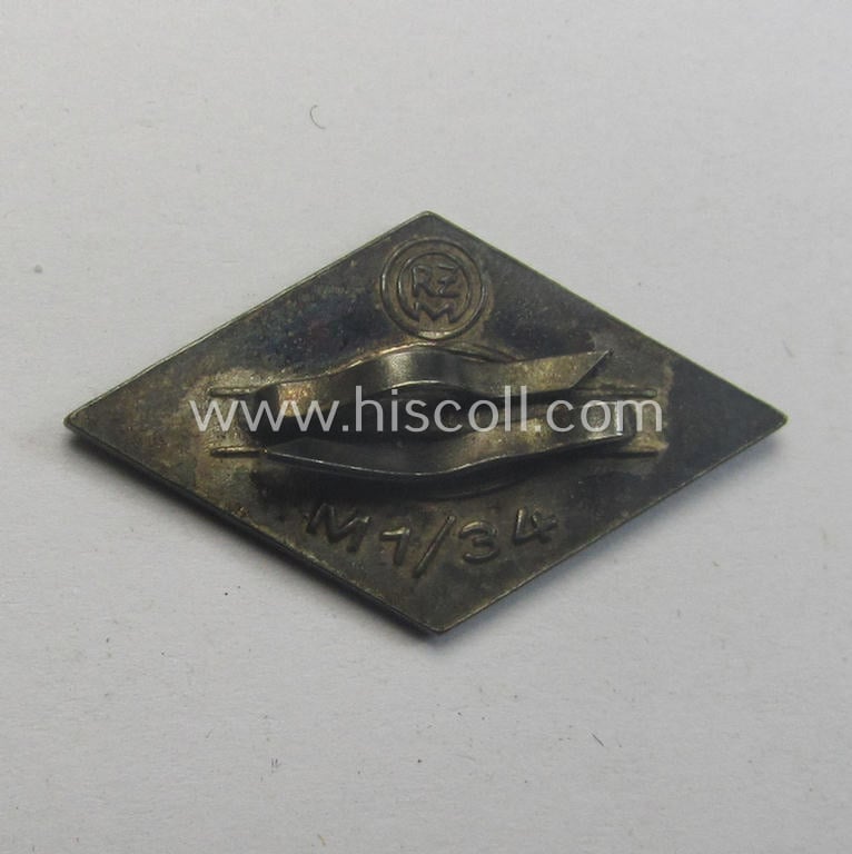 HJ (ie. 'Hitlerjugend') enamelled 'Fahrtenmesser'- (o. 'Schiffchen-Mütze') pin (ie.: 'Raute') that shows the makers-designation: 'RzM - M1/34' on its back