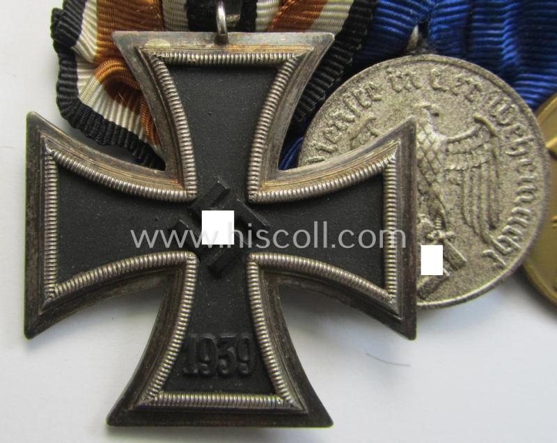 Three-pieced WH (Luftwaffe) medal-bar (ie.: 'Ordenspange') resp. showing an: 'EKII. Kl.', a: 'WH-DA der 4. Stufe' (with down-tailed eagle-device) and a: Czech 'Anschluss'-medal