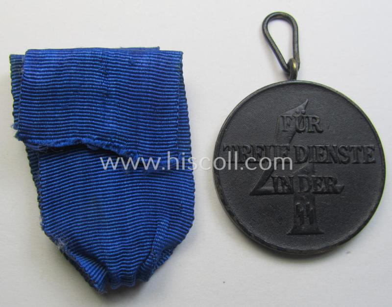 Superb - and actually rarely encountered! - 'SS-Dienstauszeichnung der 4. Stufe' (or black-toned, loyal-service medal for 4 years of loyal-service in the SS) that comes together with its original (and slightly used) ribbon (ie. 'Bandabschnitt')