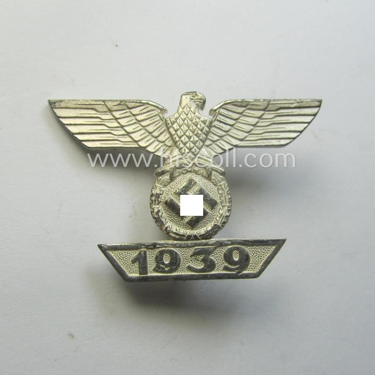 'Wiederholungsspange zum EK I.Kl.' (or: bar to the WWI IC 1st class) being a typical, maker- (ie. 'L/11'-) marked example as was produced by the maker (ie. 'Hersteller') named: 'Wilh. Deumer'