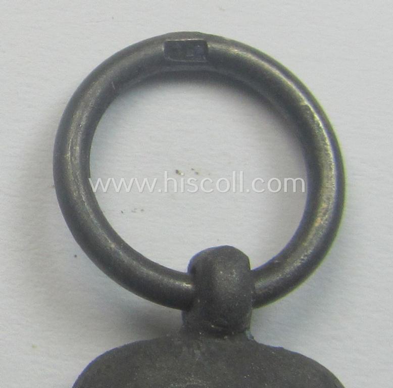 Neatly maker- (ie. '15'-) marked medal: 'Winterschlacht im Osten 1941/42' that came stored in its period pouch by the (Austrian-based) company: 'Friedrich Orth'