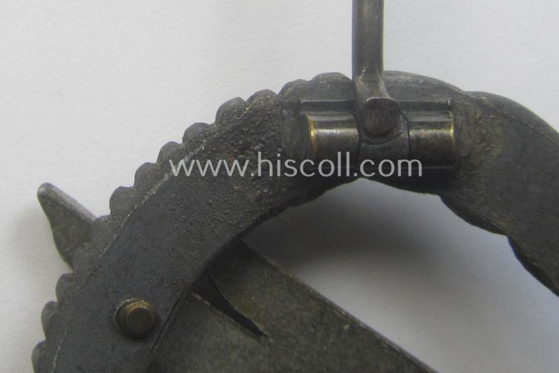 Zinc- (ie. 'Feinzink'-) based version of a WH (Luftwaffe) 'Fallschirmschützen-Abzeichen' (being a maker-marked, 'Type A'-pattern example as was produced by the 'G.H. Osang'-company)