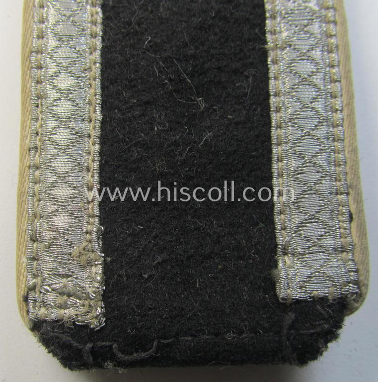 Superb - albeit regrettably single! - Waffen-SS NCO-type shoulderstrap as piped in the white-coloured branchcolour as was intended for usage by an: 'SS-Unterscharführer' who served within the: 'Waffen-SS Infanterie-Truppen'