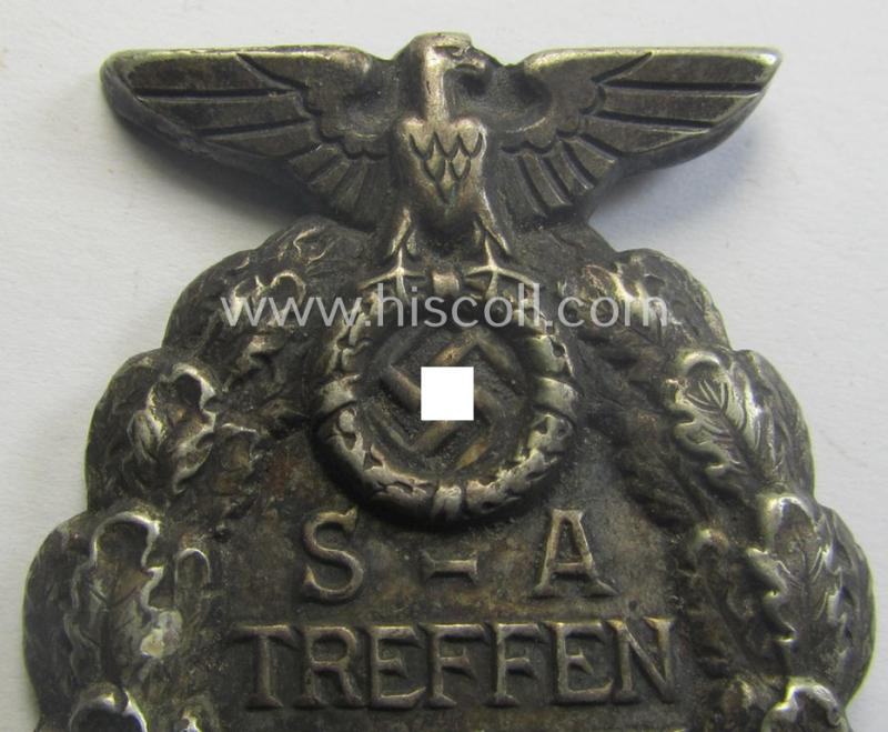 Commemorative, hollow-back- and/or silverish-grey-toned, so-called: SA- (ie. 'Sturmabteilungen'-) related day-badge (ie. 'tinnie') as executed in 'Buntmetall' that is showing the text: 'SA-Treffen Braunschweig - 17./18. Oktober 1931'