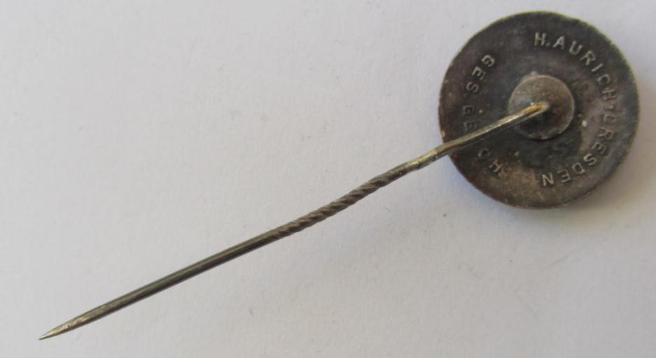Attractive, semi-enamelled, so-called: RLB- (ie. 'Reichluftschützbund') 'Amtsträgerabzeichen' or: civil-attire badge (of the first pattern), bearing a neat makers-mark ('H. Aurich') and patent-pending- (ie. 'Ges.Gesch.'-) marking on its back
