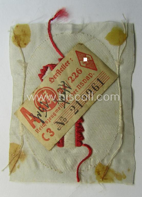 HJ/BDM (ie. 'Hitlerjugend'/'Bund Deutscher Mädel') trade- or specialist-armbadge as executed in neat 'BeVo'-weave pattern as was intended for usage by a: 'Feldscher' (or: medical orderly) still retaining its period 'RzM'-etiket