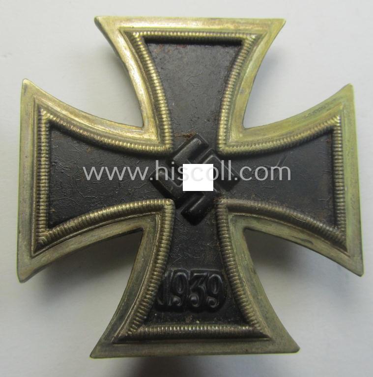'Eisernes Kreuz 1. Kl.' (or: Iron Cross 1st class) being a (typical) maker- (ie. '7'-) marked example as was produced by the maker (ie. 'Hersteller'): 'Paul Meybauer'