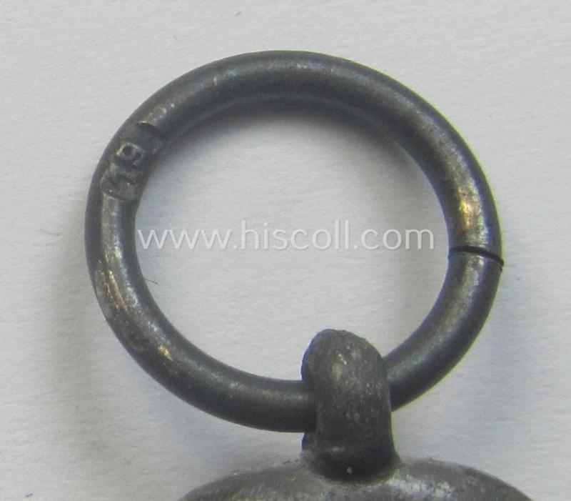 Neatly maker- (ie. '19'-) marked medal: 'Winterschlacht im Osten 1941/42' that came stored in its period pouch by the company: 'E. Ferd. Wiedmann'