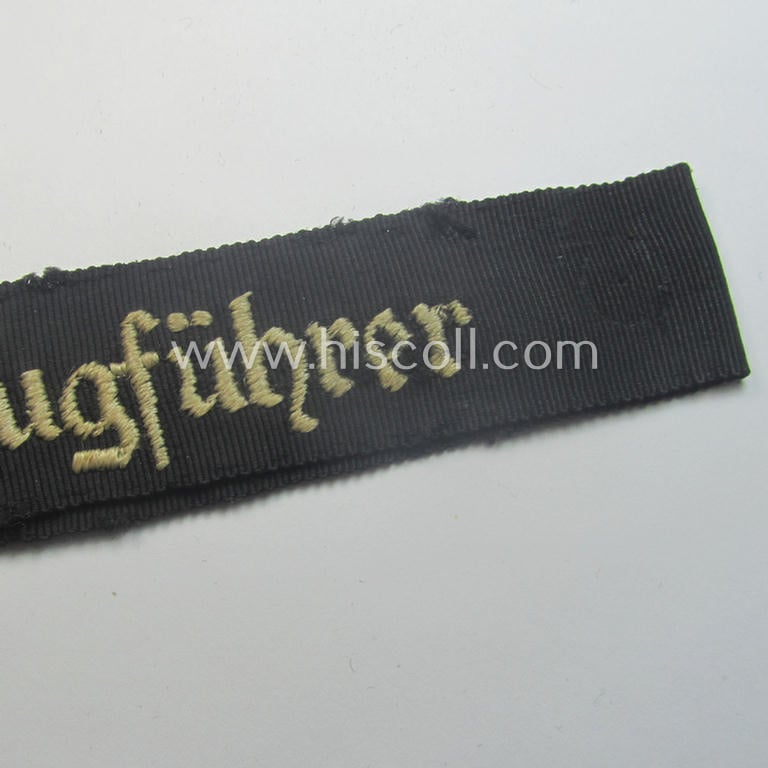 Superb - and actually rarely encountered! - example of the HJ- ('Hitlerjugend' ie. 'Flieger-Hitlerjugend'-) cuff-title (ie. 'Ärmelstreifen') entitled: 'Segelflugzeugführer' being an example as executed in the machine-embroidered pattern