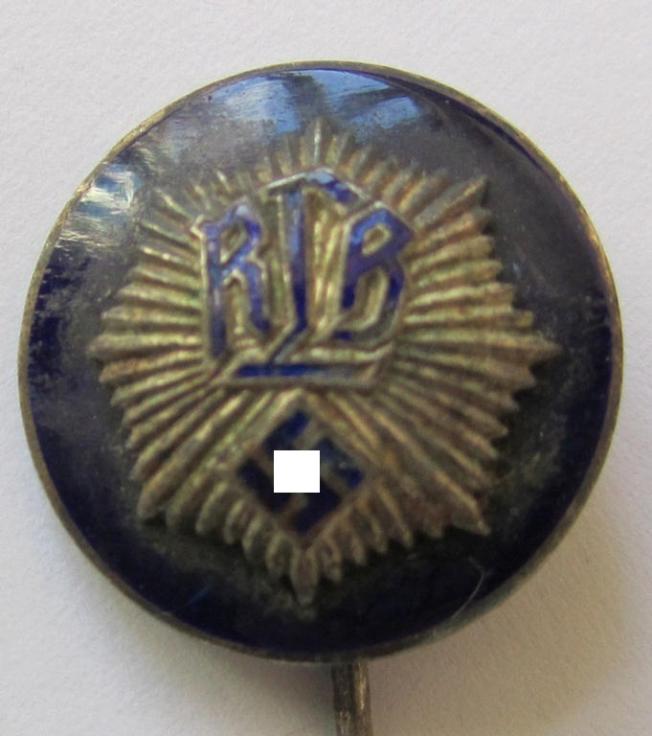 Attractive, semi-enamelled, so-called: RLB- (ie. 'Reichluftschützbund') 'Amtsträgerabzeichen' or: civil-attire badge (of the first pattern), bearing a neat makers-mark ('G. Brehmer') and patent-pending- (ie. 'Ges.Gesch.'-) marking on its back