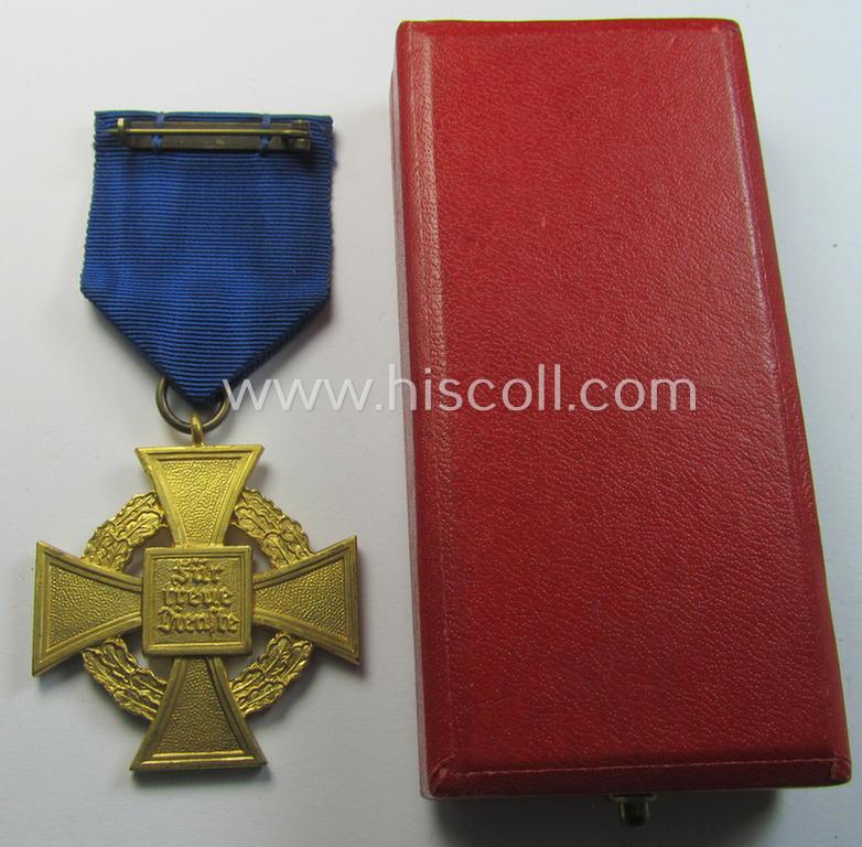 'Treuedienst Ehrenzeichen 1. Klasse' being a (typical) non-maker-marked example that came mounted onto its original ribbon (ie. 'Bandabschnitt') and that comes stored in its equally non-maker-marked etui as issued