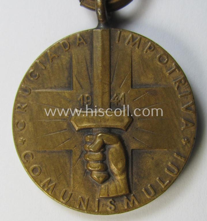 Romanian medal: 'Kreuzzug gegen den Kommunismus' (or in Romanian language: 'Medalia - Crusiada Impotriva Communismului') that comes mounted onto its original (and neatly pre-confectioned!) ribbon as issued