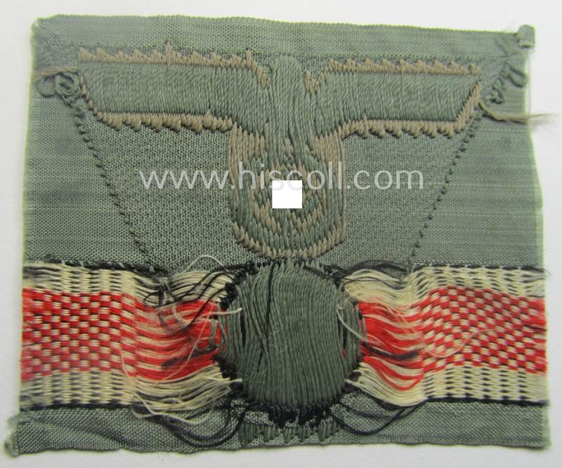 WH (Heeres) so-called: 'M43-pattern') cap-eagle/cocarde (ie. cap-trapezoid) as was specifically produced for usage on the so-called: 'M-43'-model field-caps (ie. 'Einheitsfeldmützen')