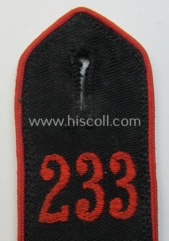 Single - and just moderately worn - bright-red-piped so-called: 'Allgemeine-HJ'-shoulderstrap as intended for a: 'HJ-Junge' who served within the 'Bann 233' (233 = 'Bann Gladbach-Rheydt' situated in the 'Gebiet West Ruhr-Niederrhein')