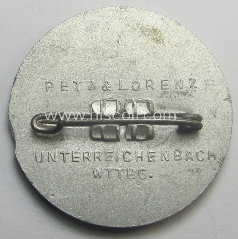 'KdF'- ('DAF- o. Kraft durch Freude'-) related day-badge (ie. 'tinnie') depicting a small train an child coupled with the text that reads: 'Die deutsche Arbeitsfront - NS Gemeinschaft KdF - Urlaubsfahrten 1939 - Gau Württemberg-Hohenzollern'