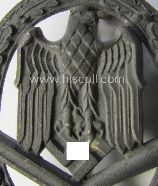 'Allgemeines Sturmabzeichen' being a non-maker-marked, zinc- (ie. 'Feinzink'-) based example by: 'C.E. Juncker'