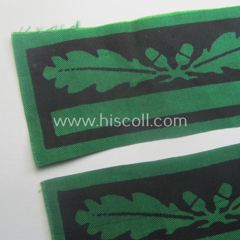 Pair of officers'-pattern, WH (Heeres o. Waffen-SS) rank-insignia-bars (for usage on the various camouflaged-uniforms) as was used by an officer holding the rank of: 'Leutnant' (ie.: 'SS Untersturmführer')