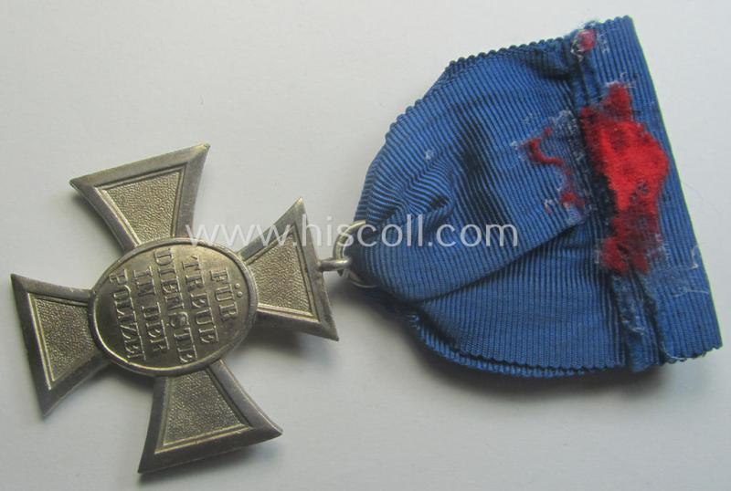 Silver-class 'Pol.-Dienstauszeichnung 2. Stufe' (or: police loyal-service medal second-class) that comes mounted onto its (typically broader-shaped) ribbon (ie. 'Bandabschnitt')