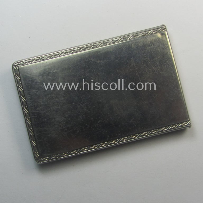 Interesting, WWII-period 'souvenir-item' (ie. tiny note-book) showing on its front an illustration of a steel-helmet and upright-positioned sword coupled with the text: 'Westfront'