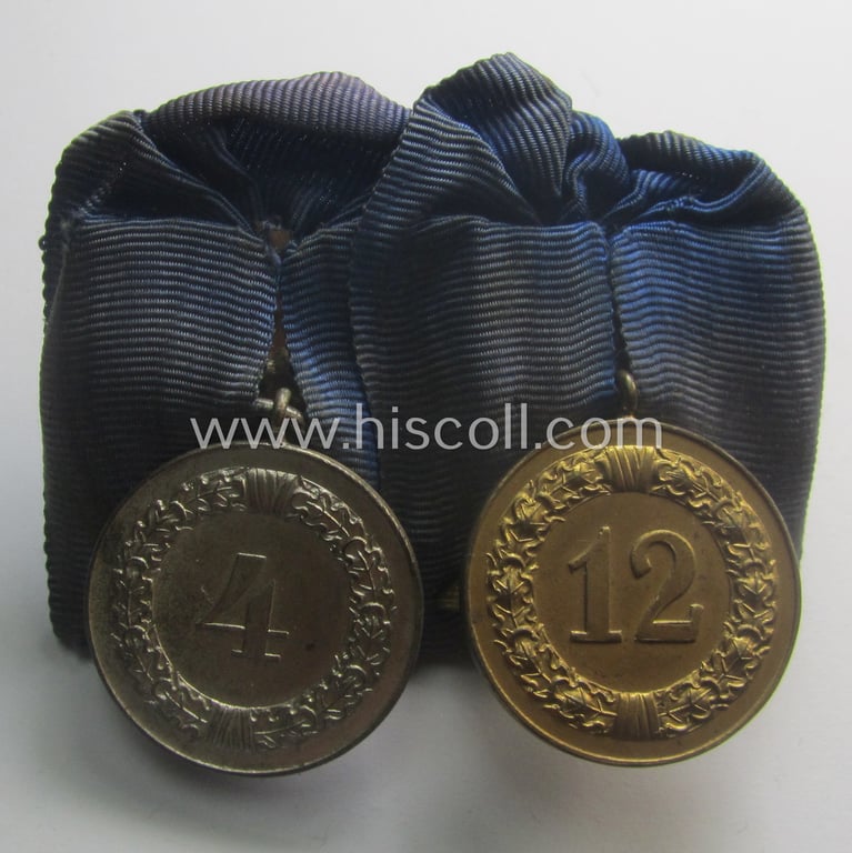 2-pieced medal-bar (ie. 'Spange') showing two: WH (Heeres o. Kriegsmarine) so-called: 'Dienstauszeichnungen für 4 u. 12 Jahre Treue Dienste' that both come period-mounted as a so-called: 'Doppelspange'