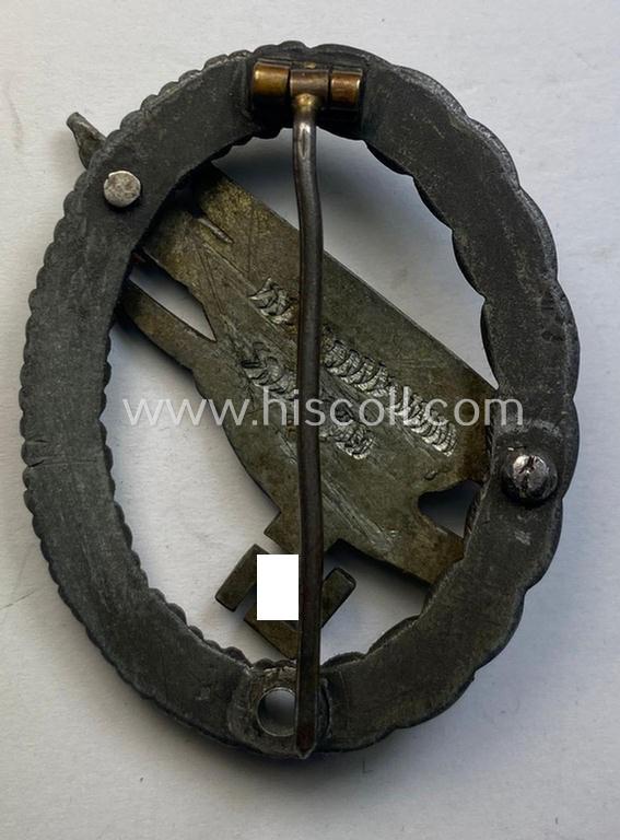 Interesting - albeit clearly incomplete and damaged - zinc- (ie. 'Feinzink'-) based version of a WH (Luftwaffe) 'Fallschirmschützen-Abzeichen' (being a maker-marked, 'Type A'-pattern example as was produced by the 'G.H. Osang'-company)