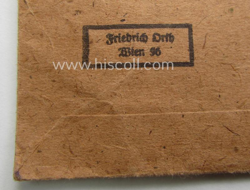 WH (Heeres ie. Waffen-SS) 'Krim'-campaign-shield (by the maker: 'Friedrich Orth') that comes stored in its period (and rarely seen!) 'Zellstoff'-based pouch and that comes in a probably issued- (albeit still 'virtually mint'-), condition