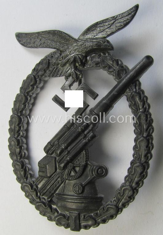 Attractive - and actually not that often seen! - later-war-period, 'Feinzink'-based example of a WH (Luftwaffe) 'Flakkampfabzeichen' (as was produced by a to date unknown maker and that comes stored in its typical etui)