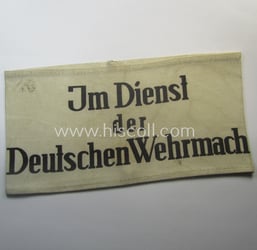 Linnen-based- and/or neatly printed, white-coloured armband (ie. 'Armbinde')...