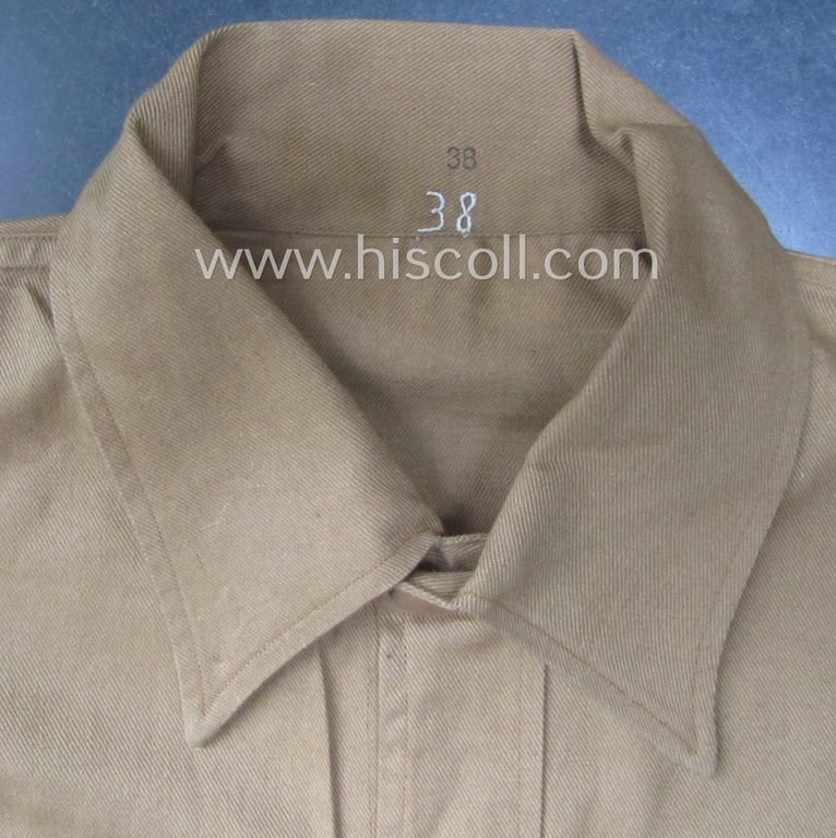 Hardly used, HJ- (ie. 'Hitler-Jugend'-) 'standard-issue'-pattern, beige-brown- (ie. 'braunes'-) coloured: 'under-the-tunic'-shirt (ie. 'Braunhemd nach Vorschrift des RJF') that comes in a wonderful condition