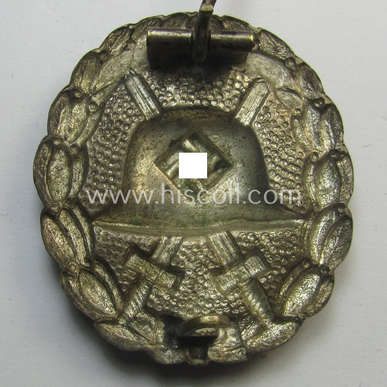 Luxuriously-styled, early-pattern silver-class wound-badge (ie.: 'Verwundeten Abzeichen in Silber') being a detailed so-called: 'Spanish Civil-War'-version that comes in a clearly used- and/or worn, condition