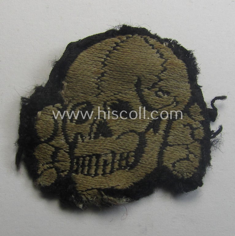 Superb - and nowadays rarely encountered! - Waffen-SS, 'BeVo'-woven-style skull- and cap-eagle-set (ie. 'Totenkopf- u. Adler-Effektensatz für Schiffchen o. Einheitsfeldmütze') that comes in a moderately used- and/or cap-removed, condition