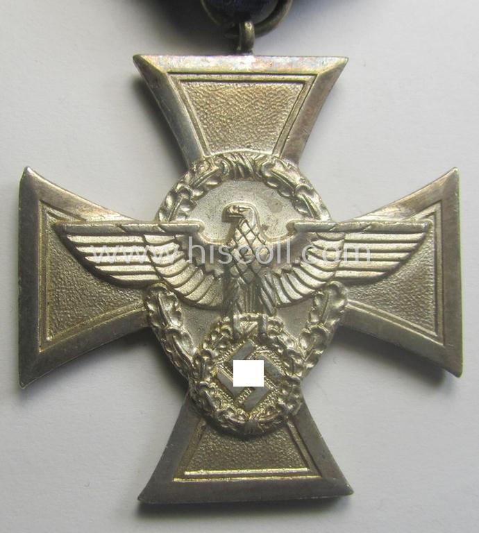 Silver-class 'Pol.-Dienstauszeichnung 2. Stufe' (or: police loyal-service medal second-class) that comes mounted onto its (typically broader-shaped) ribbon (ie. 'Bandabschnitt')