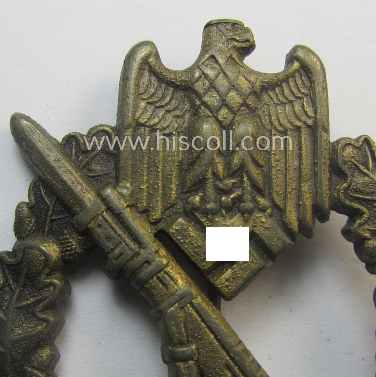 Superb, 'Infanterie Sturmabzeichen in Bronze' being a maker- (ie. 'MK' in a triangle-) marked (and/or minimally converse- ie. vaulted-) example by a to date still unidentified maker as was executed in golden-bronze-toned 'Feinzink'