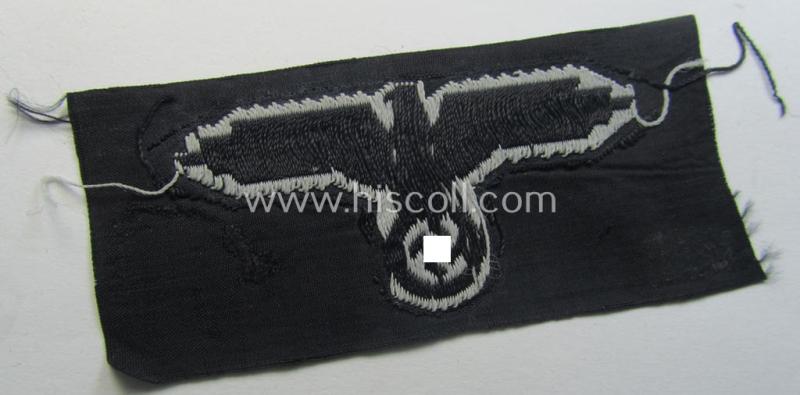 Mid- (ie. later-) war-pattern 'Waffen-SS'-type so-called: 'BeVo'-pattern, EM- (ie. NCO-) type side-cap eagle that comes in a never used- (ie. unconfectioned and 'virtually mint- ie. unissued'-), condition