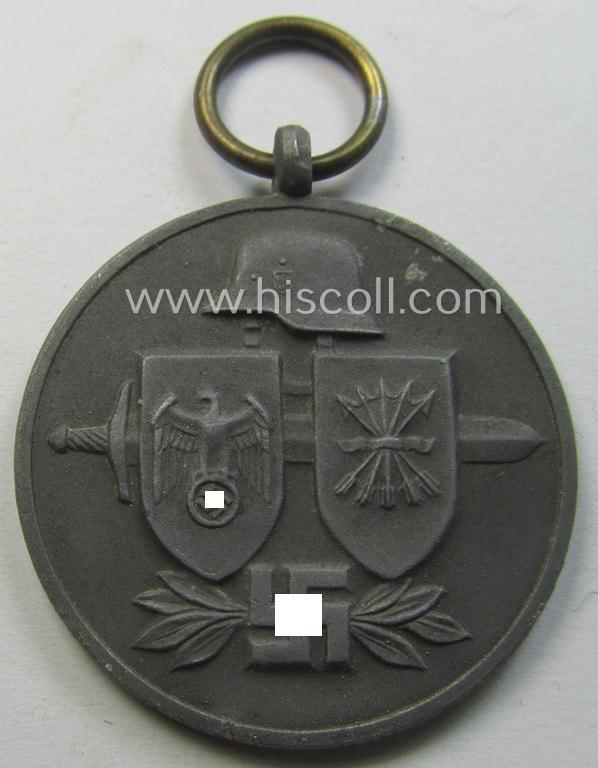 'Errinnerungsmedaille für die Spanischen Freiwilligen im Kampf gegen den Bolschevismus' being a maker- (ie. '1'-) marked example