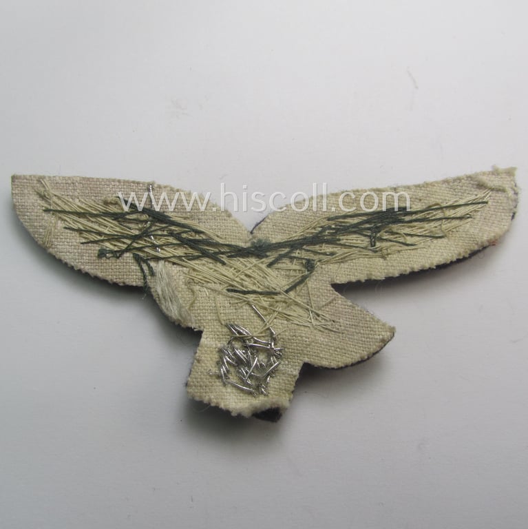 'Virtually mint' WH (Luftwaffe) officers'-pattern breast-eagle (ie. 'Brustadler für Offiziere der Luftwaffe') being a neatly hand-embroidered example of the: 'Extra Qualität' that comes in a never used- nor tunic-attached, condition